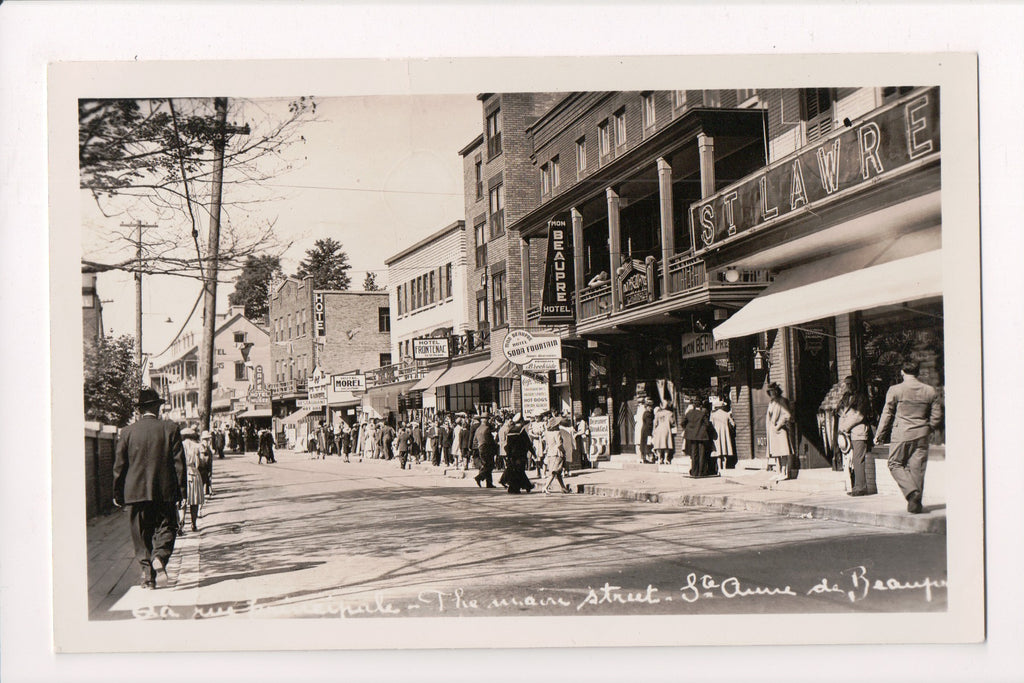 Canada - STE ANNE de BEAUPRE, QC - Man St, people, stores RPPC - F11060