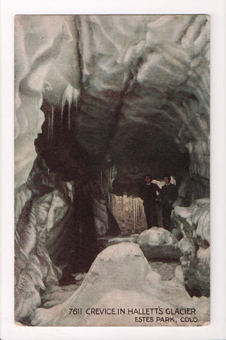CO, Estes Park - Crevice in Halletts Glacier, men inside - B17043