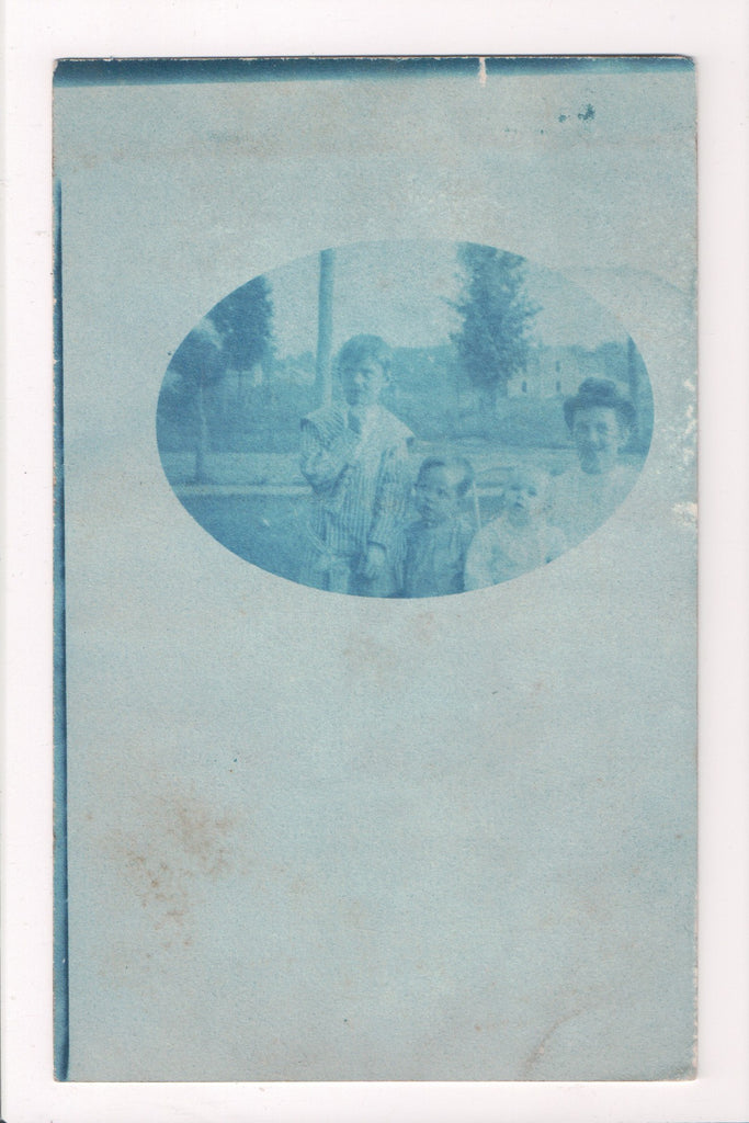 People - Family postcard - mother, 3 kids in wide oval shape - rppc cyanotype - w04143