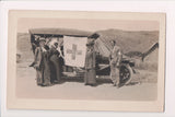Military Postcard - Red Cross flag on spoked wheeled car, people RPPC - FF0011