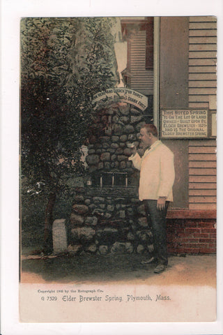 MA, Plymouth - Elder Brewster Spring, man with a metal cup closeup - A09057