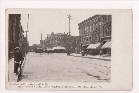 NY, Gloversville - Main and Fulton Sts - Millers (store), man on bike - MB0716