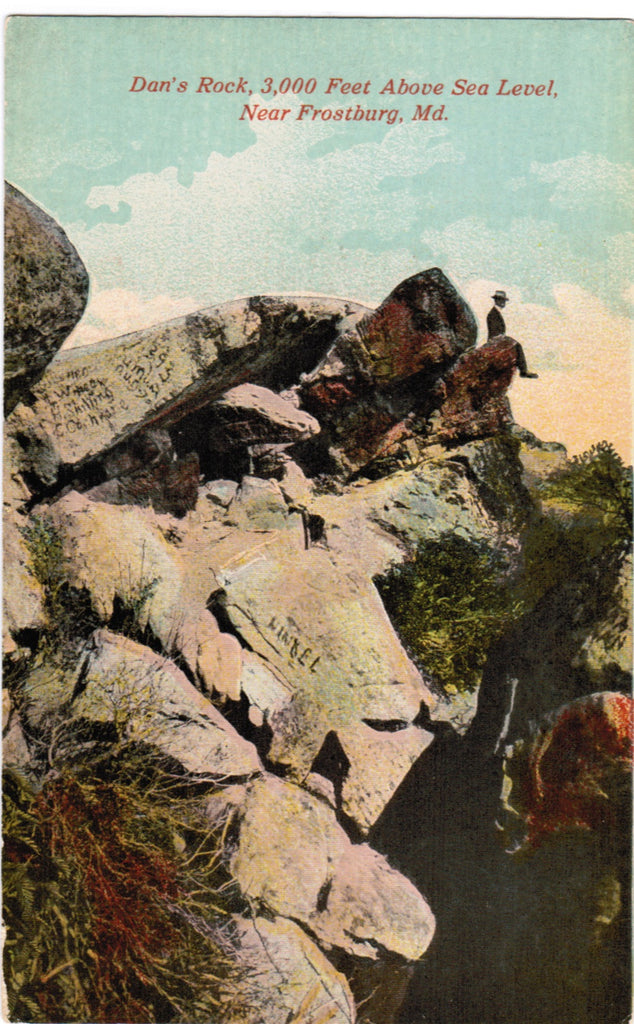 MD, Frostburg - Dans Rock closeup, man on edge - B08171