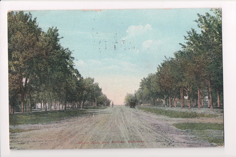 NE, McCook - Upper Main Ave, man on bike - mailed 1910 - C17375