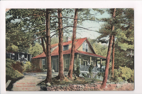 NH, Chesterfield - Lake Spofford - Granitge, person on porch - D05354