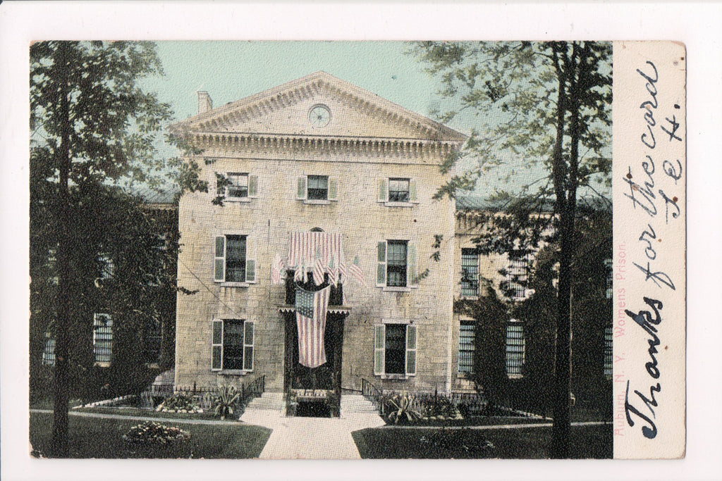 NY, AUBURN - Womens Prison, flags draping door - T J Hennessey card - w02624