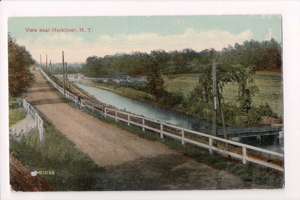 NY, Herkimer - Road by river, person on bike postcard - D17042