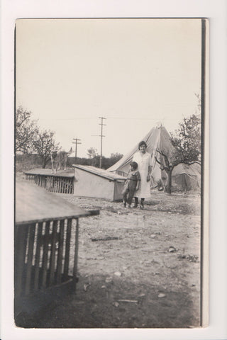People - Lady and small boy, dog on cage, tent in back - RPPC - R00621