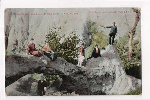SD, Wall - man with pistol in outreached hand, people on rocks - MB0843