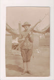 Military Man in uniform - posing with rifle, bayonet - RPPC - C08600
