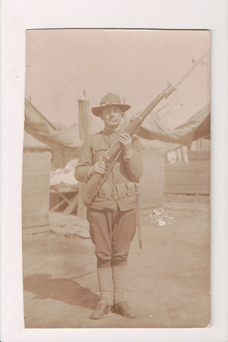 MISC - Military Man in uniform - posing with rifle, bayonet - RPPC - C08600