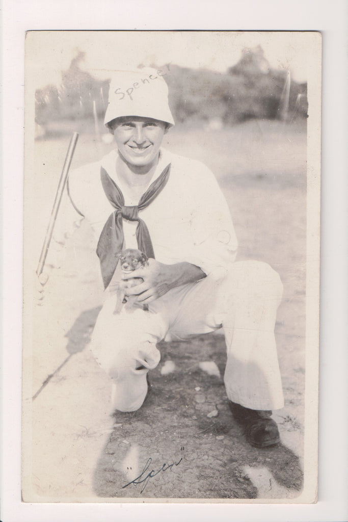 Military Man in uniform - navy - puppy - RPPC - w01835