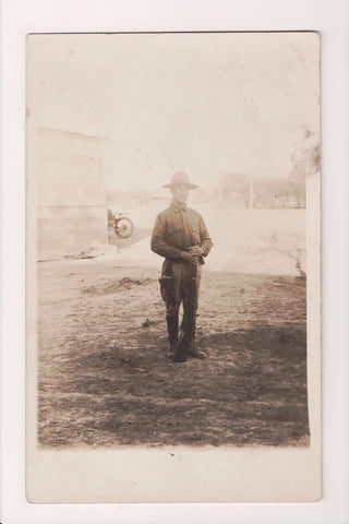 Military Man in uniform - posing - RPPC - w02486